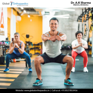 group-of-people-stretching-in-gym